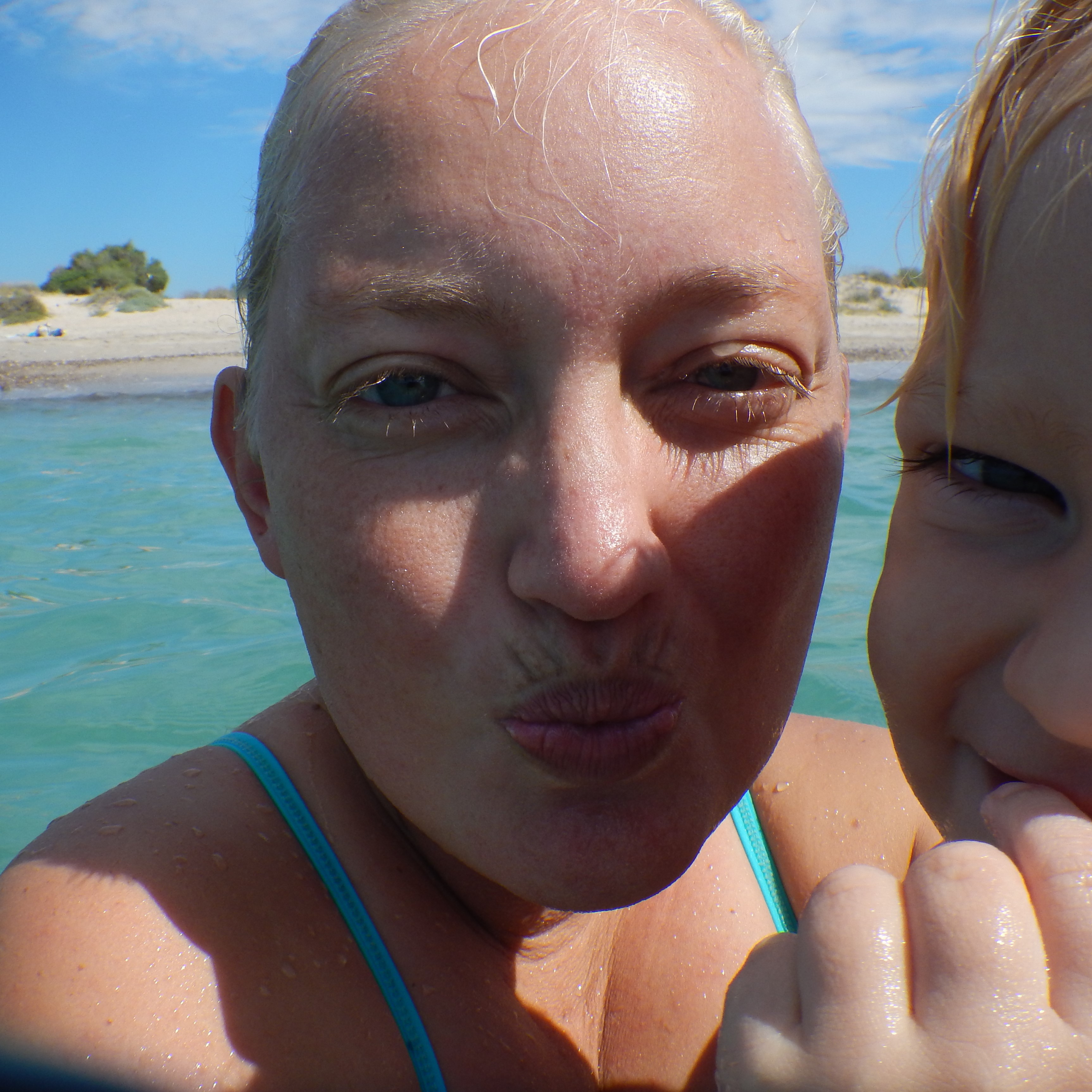 Mom's sweet, salty kisses after an ocean swim