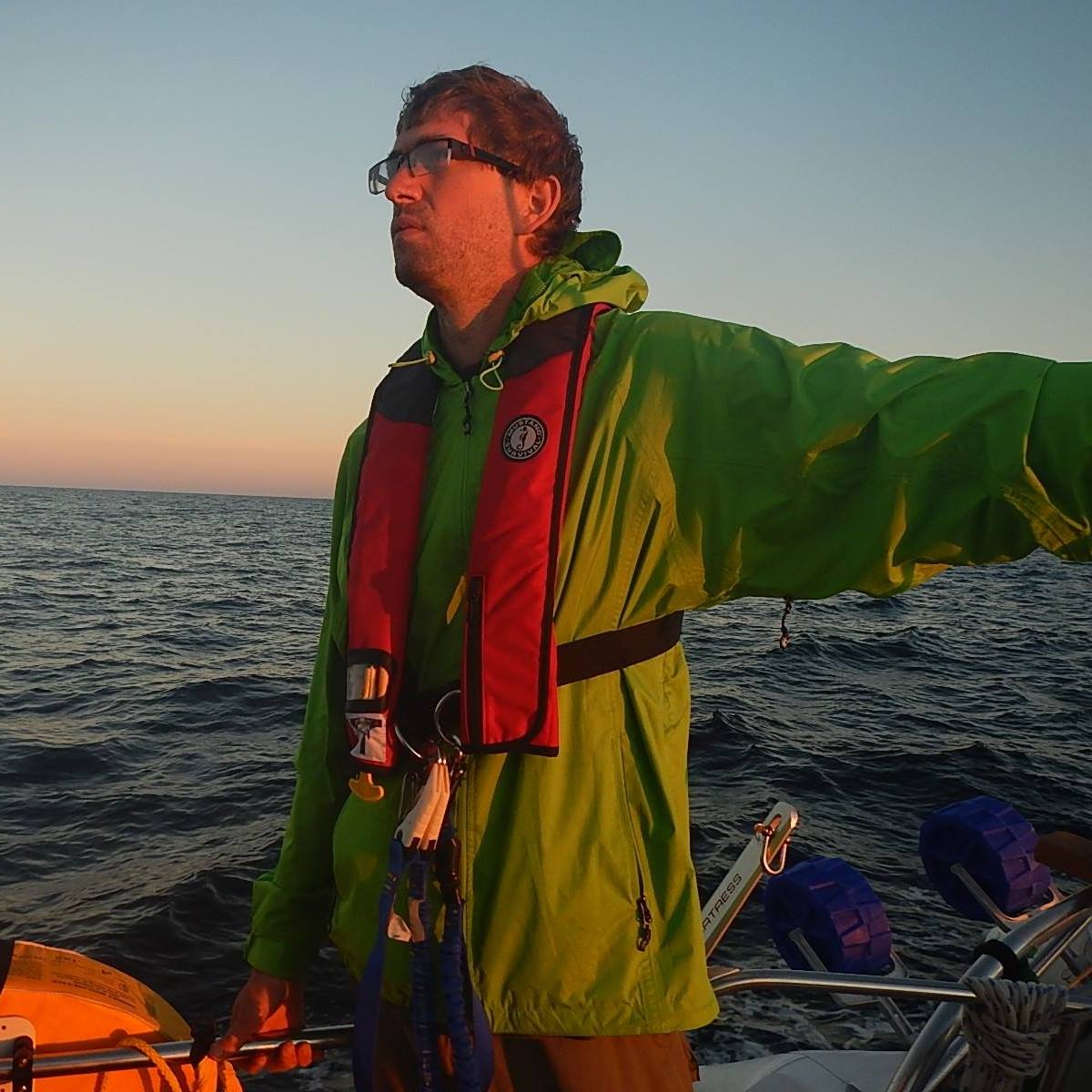 Chris sailing on a sailboat delivery in the Sea of Cortez